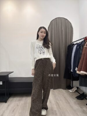 F581103 蝴蝶結亮片針織上衣